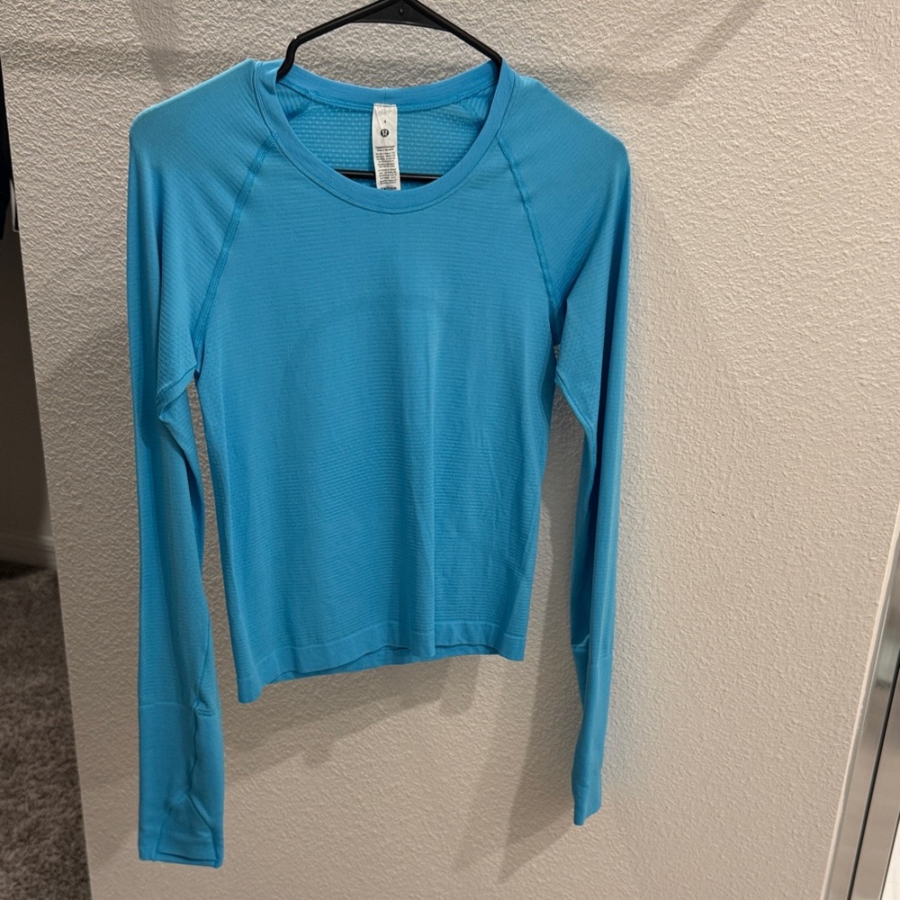 Swiftly tech long sleeve waist length